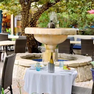 a table with a wine bottle on it