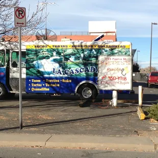 a food truck parked in a parking lot
