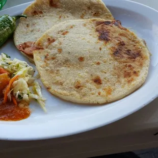 Pupusas revueltas w/roasted Chile And iced tea $9.12