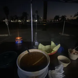 a bowl of soup with a spoon
