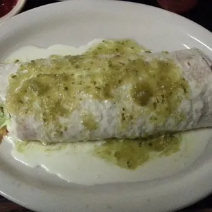 Burrito California with cheese sauce and green sauce