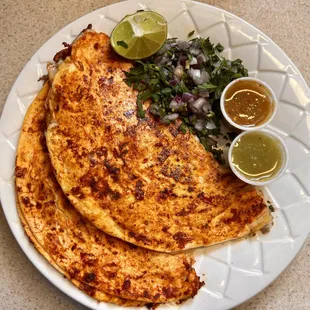 2 Quesabirrias made with flour tortillas.