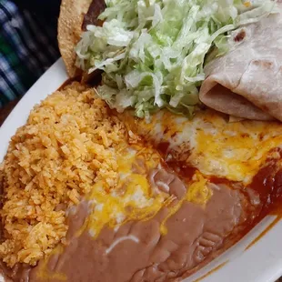 My dad's No. 5 combo plate: Taco, bean burro, enchilada with rice and beans.