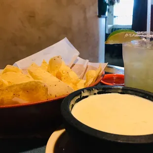 a bowl of quesadilla and a bowl of chips
