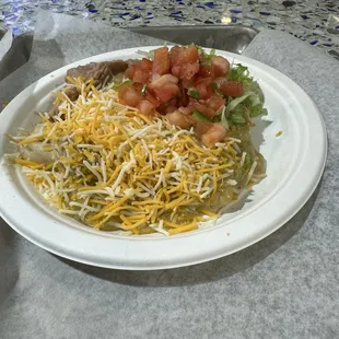 Tamales in green sauce.