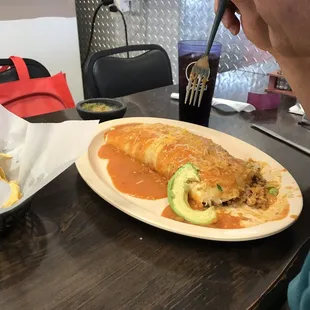 So much food. It was so tasty. A little salty for me but I loved it. We could not finish the burrito so it can Home. Quick service.