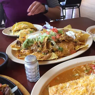 a table full of mexican food