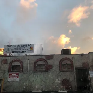 a sign on the roof of a building
