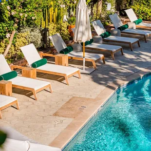 Lounge poolside at the Driftwood- a signature feature of Hotel Figueroa.