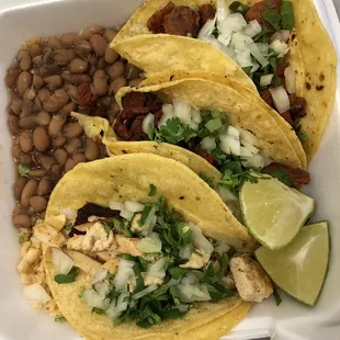 Pollo, fajita, and pastor tacos