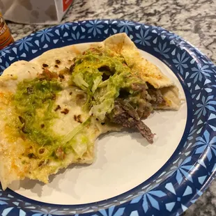 A pathetic example of a steak fajita burrito.