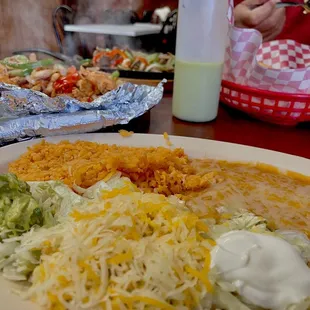 Fajita fixings (rice, beans, cheese, sour cream, guacamole, lettuce