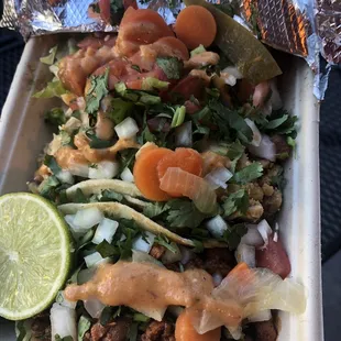 Top to bottom: shrimp, chicken, pastor tacos