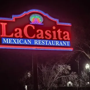 a neon sign for a mexican restaurant