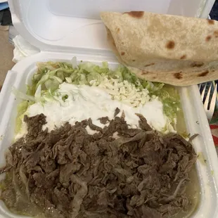 Chicken enchilada (under salad), beef fajitas, house made tortilla