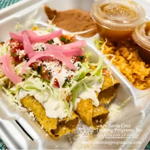 Flautas surenas are three rolled fried corn tortillas, stuffed with beef or chicken. It's served with a broth to pour over the dish.