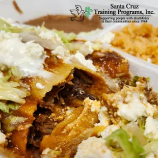 Enchiladas are rolled around your choice of chicken, cheese, or beef. Covered in a red sauce, served with rice, beans, crumbled cheese.