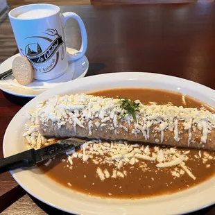 a burrito and a cup of coffee