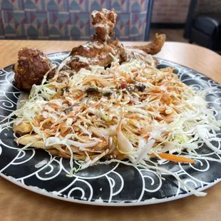 Pollo con Tajades (Chicken with slices of green plantain).