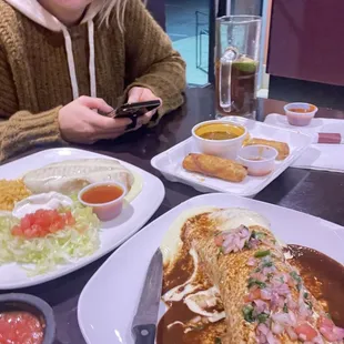 Birria egg rolls, Catrina burrito, chimichanga.