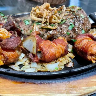 Steak and bacon wrapped shrimp