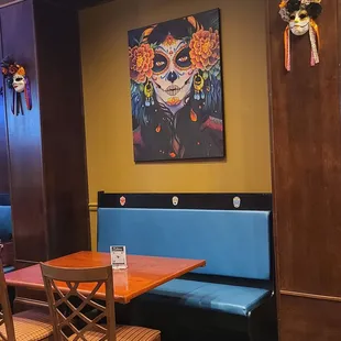 a table and bench in a restaurant