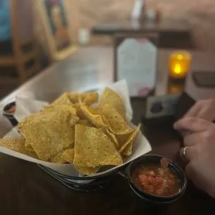 a plate of chips and salsa