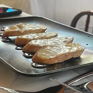 four pieces of toast on a plate