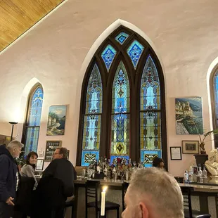 The bar next to stained glass windows!