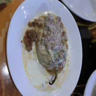 Chile relleno- A mild battered green pepper Stuffed with savory seasoned ground beef and melted cheese