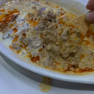 Queso con chorizo - Creamy melted cheese sauce With ground Mexican mild sausage