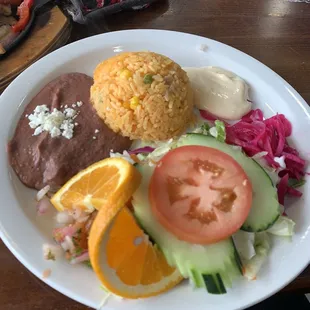 Rice,refried beans and salad