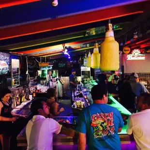 people sitting at the bar