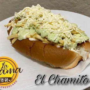 a hot dog covered in guacamole