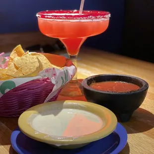Strawberry margarita on the rocks with chips to start.... yummy