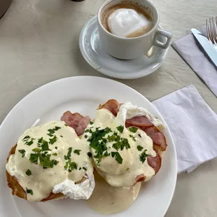 Eggs Benedict and cappuccino