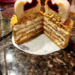 Cross section of honey cake and mousse cake