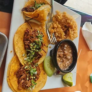 birria tacos with rice and beans