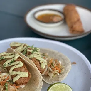 fish tacos and duck roll (only one per order)