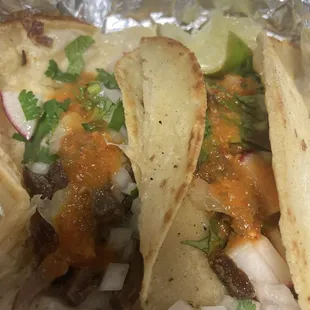 Lengua tacos with their salsa. Pretty certain it is habanero. Soooo tasty.