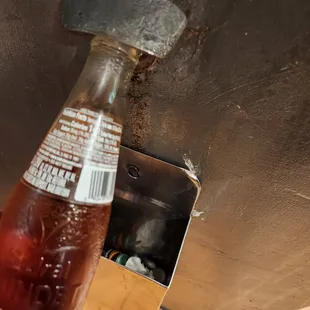 Old school bottle opener, with plenty of bottle sodas