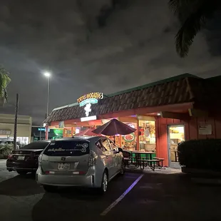 The outside of the restaurant and parking