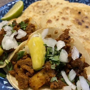 Combo #1: tacos al pastor and pupusas. 10/10, recommend!!!