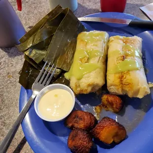 Two chicken tamales and fried plantains
