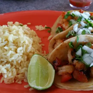Camerone tacos that just changed my life. Grilled tomatoes and peppers underneath the shrimp. Fabulous!