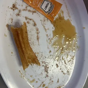 Churros...what's left of them. Don't be out off by the packet of caramel, these churros will have me coming back for more. PERFECTION.