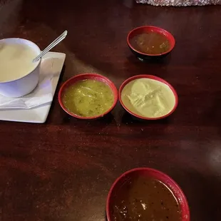 The various sauces that come with the chips.   Blanco queso was $4.50.