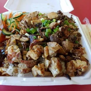 Nomuraki mix  (pickled cucumber carrot mix veg, chicken, beef).  Generous portion. &quot;Sauce on the side- literally&quot;. ($8.50)