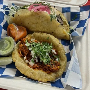 Chicken Tinga taco and Black al Pastor Empanada