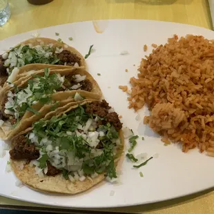 3 Taco Dinner- ground beef, onions, and cilantro on the corn shell tacos with side of rice